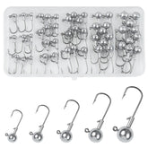 Close-up of unpainted round ball jig head with sharp hook